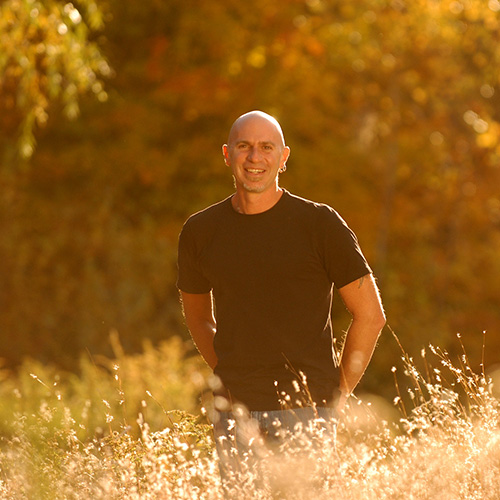 Mitch Alden in a beautiful field